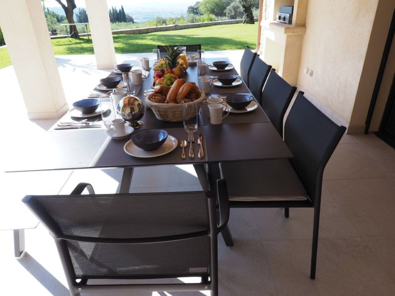 ... outdoor dining room equipped with pancha (hotplate grill) ...